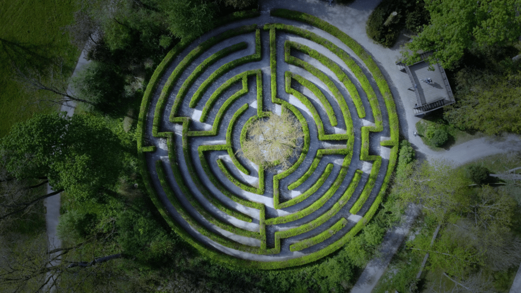 aerial view of a maze made from hedges. Circular