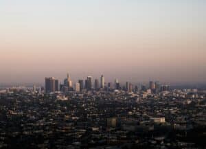 City scape of Los Angeles with an orange to pink sky